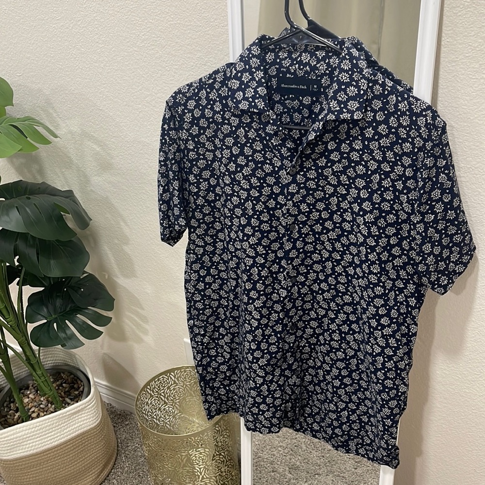 Abercrombie shirt well taken care of, no rips no tears.